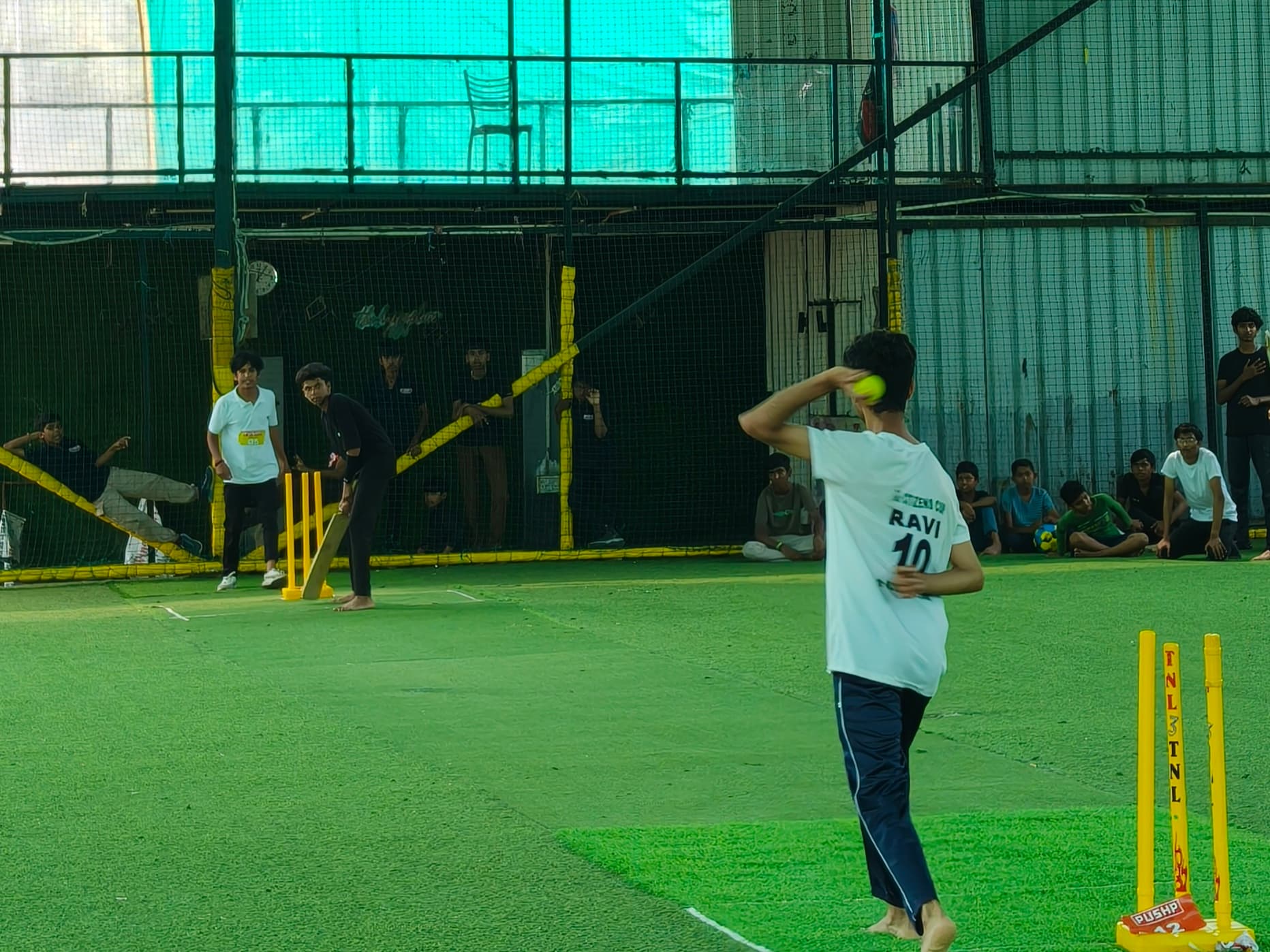 Children participating in a cricket match